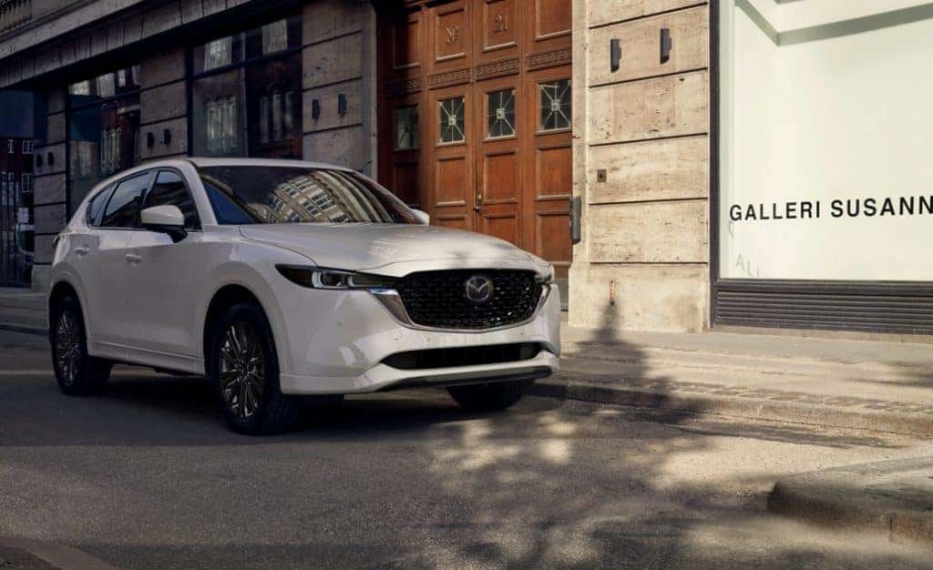 white CX-5 SUV in town