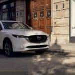 white CX-5 SUV in town