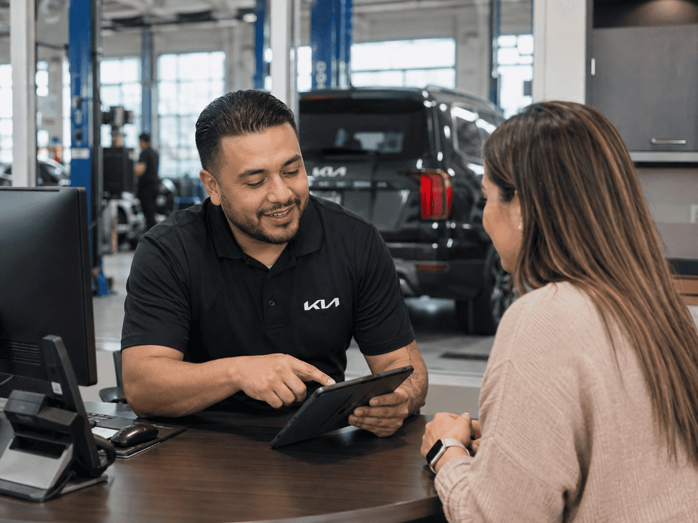 Trained automotive technician servicing a vehicle at Keys Auto Center in Key West