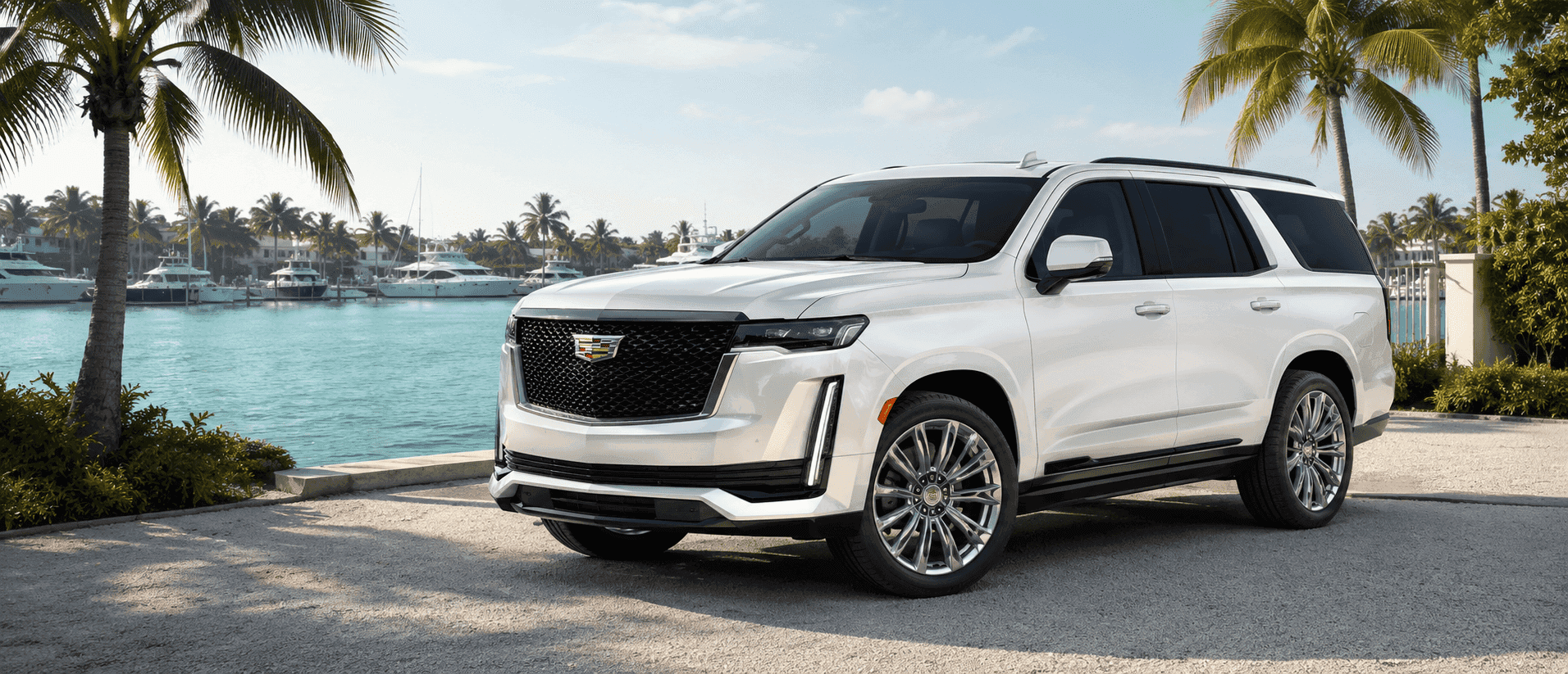 2026 Cadillac Escalade dashboard with its wide display, steering wheel, and center console