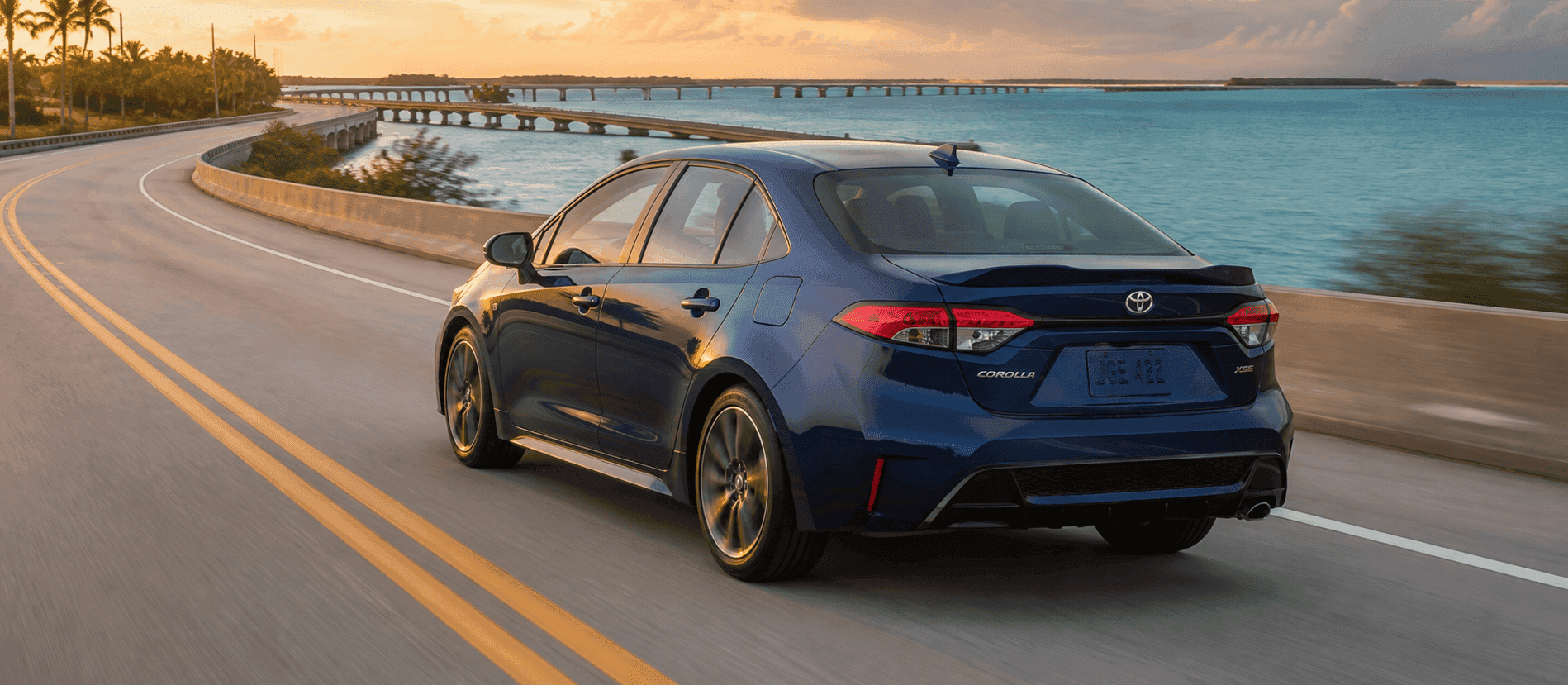 2026 Toyota Corolla Hybrid traveling efficiently along a Florida Keys coastal road