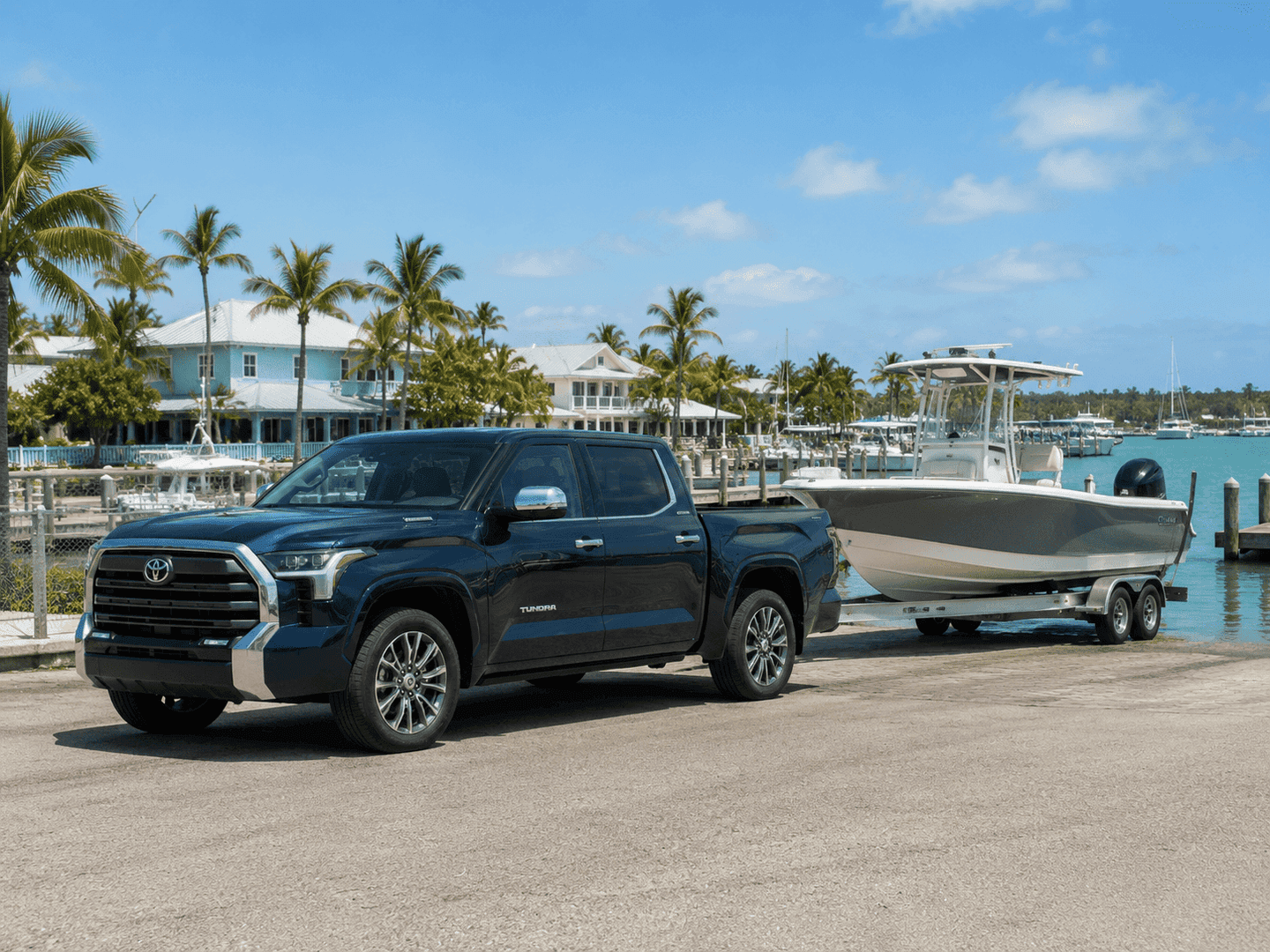 2026 Toyota Tundra i-FORCE MAX hybrid driving on a coastal Florida Keys road