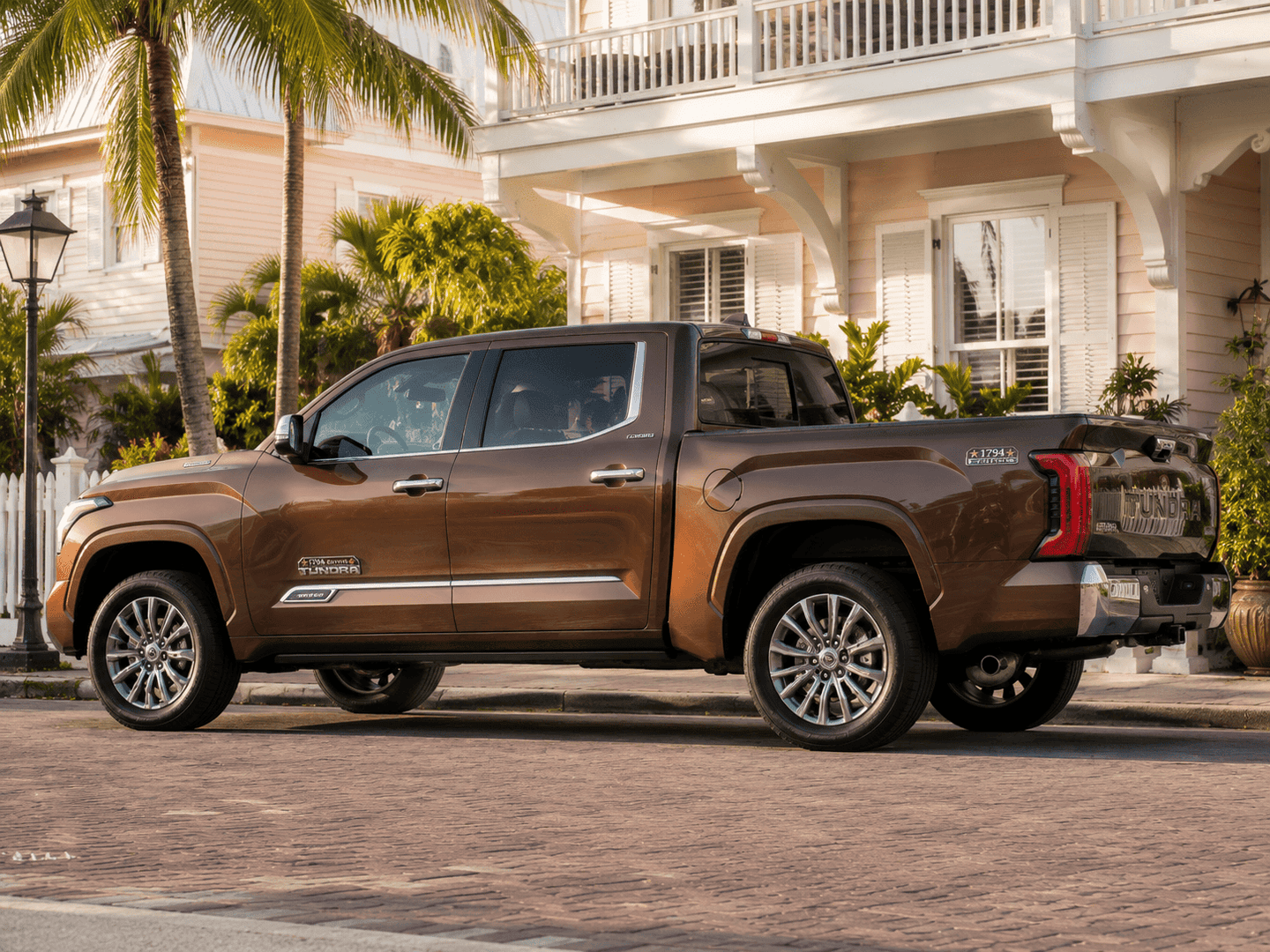 2026 Toyota Tundra showing its wide stance, LED lighting, and pickup-bed proportions in Key West