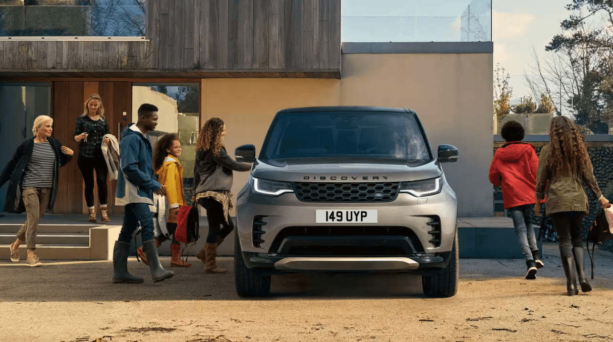People gathering around the 2024 Discovery
