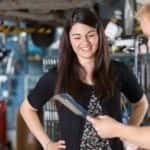 Mechanic Talking to Woman about her vehicle