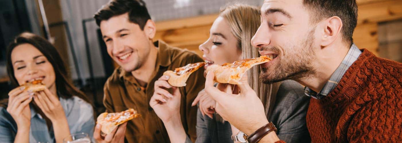 friends eating pizza