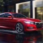 2018 honda accord red exterior driving down road in rain