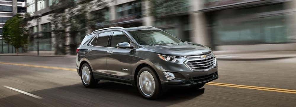 2019 chevy equinox silver exterior driving down road