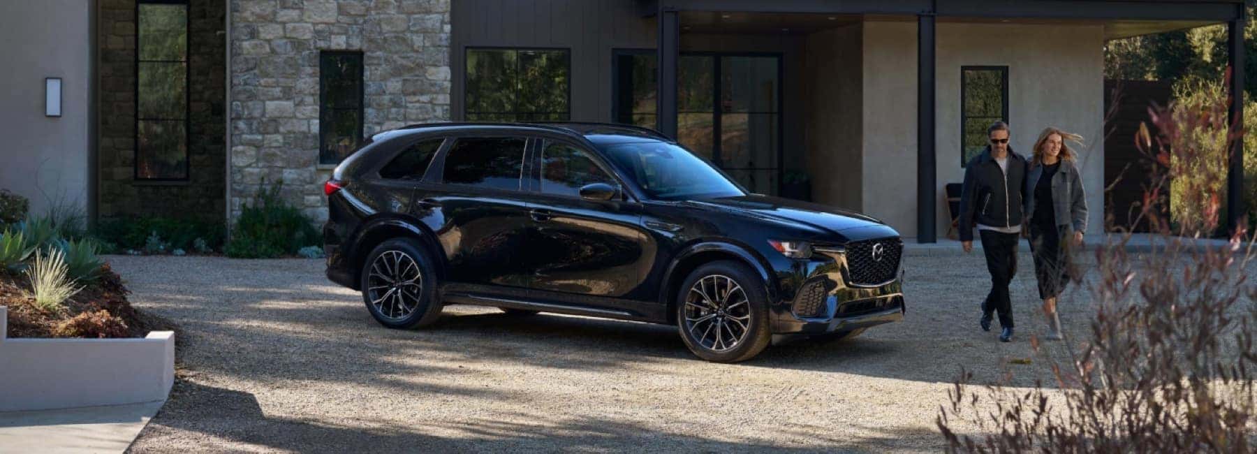 2026-mazda-cx-70-parked-with-couple
