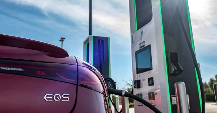 Mercedes-Benz EQS sedan plugged in to a charger