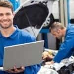 Mechanic Working on Computer