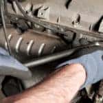 Technician performing mechanical repairs