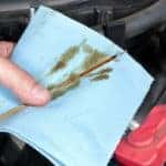 Auto Mechanic Checking Oil cropped