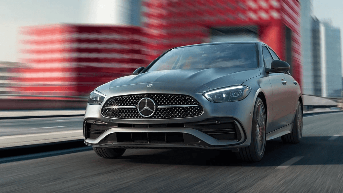 New Mercedes-Benz C-Class driving on a city highway
