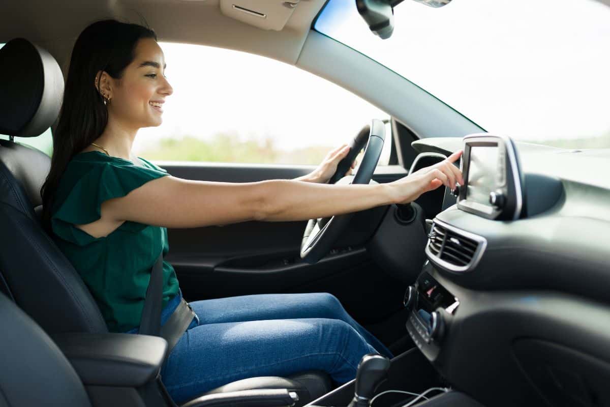 Young woman experiencing the benefits of her Mercedes-Benz hybrid