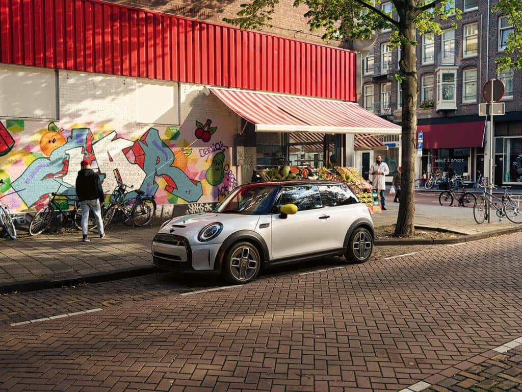 2023 MINI Hardtop 2 Door parked on a vibrant city street