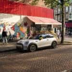 2023 MINI Hardtop 2 Door parked on a vibrant city street