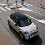 The 2023 MINI Cooper Hardtop 2 Door driving down a city street