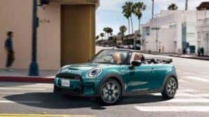 A MINI Cooper driving at peak performance just after receiving a MINI Cooper Oil Change