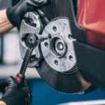 Inspecting brakes as part of a MINI service schedule