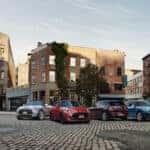MINI Cooper Certified Pre-Owned vehicles parked in a city