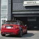 Vehicle pulling into the service bay at a MINI dealership