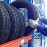 Technician picking out new MINI tires