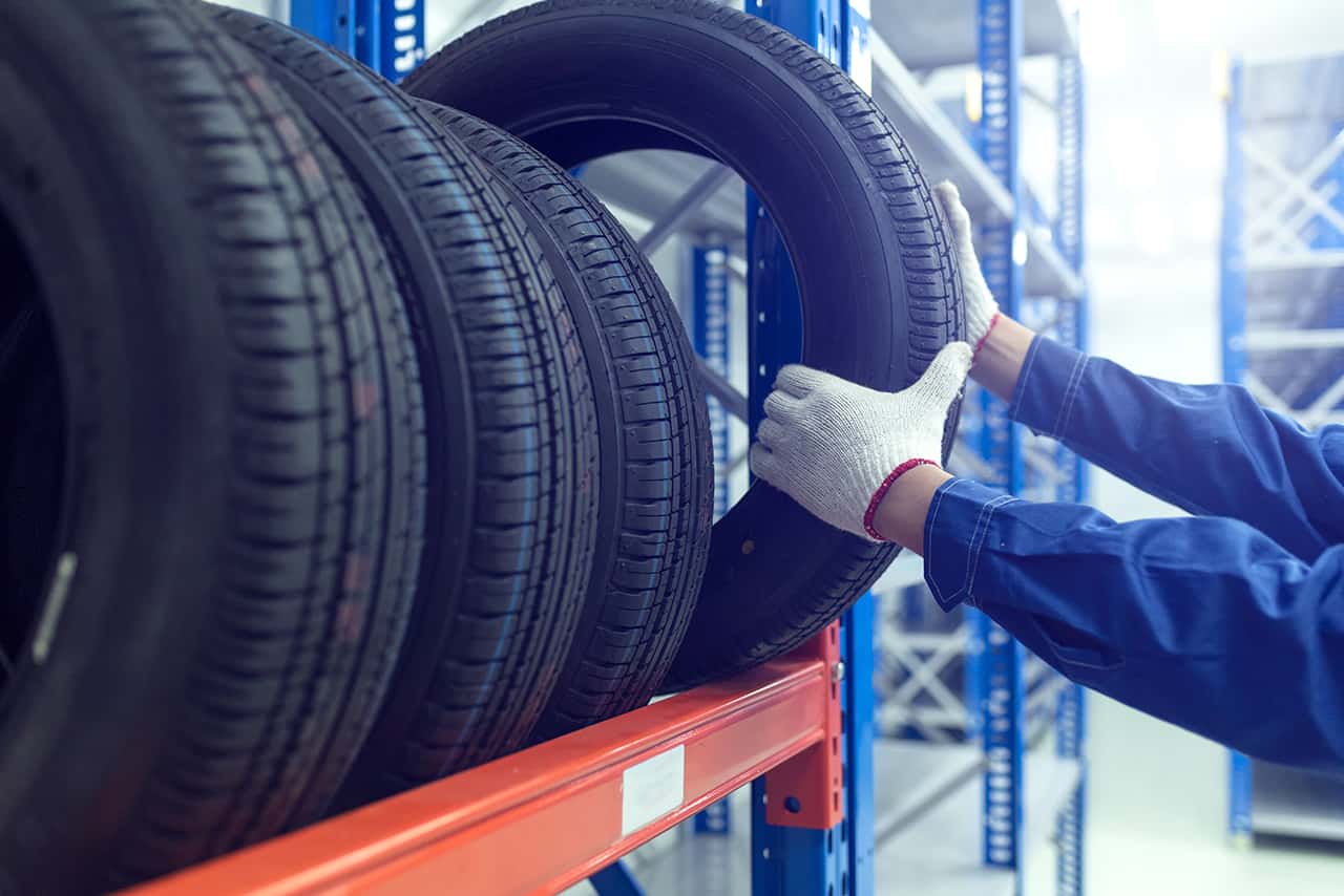 Technician picking out new MINI tires
