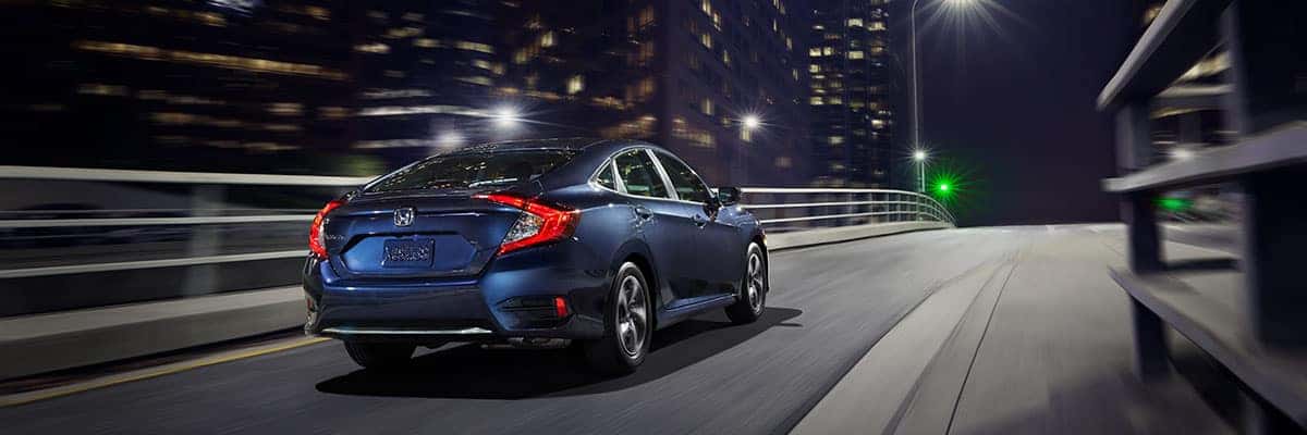 2019 Honda Civic 2019 Honda Civic driving down street a night