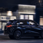 2026 Honda HR-V driving down a city street at night