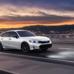 2025 Honda Civic Si driving on the highway at sunset