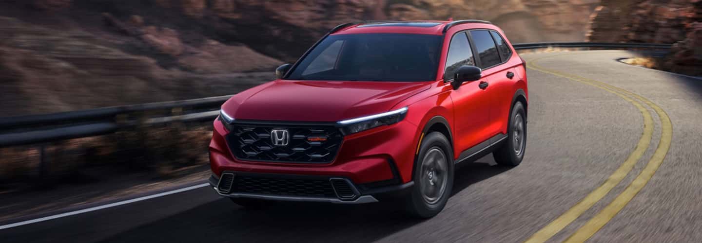 2026 Honda CR-V Hybrid driving on highway
