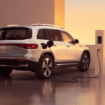 A Mercedes-Benz EQB 350 charging at an electric vehicle charging station.