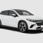 A white Mercedes-Benz EQS 450 parked in a white room.