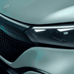 The front headlights of the Mercedes-Benz AMG EQE SUV.