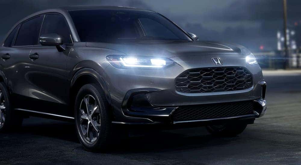 A close-up on the front of a grey 2025 Honda HR-V.