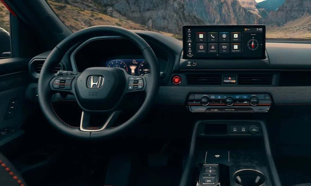 The black dash is shown in a 2026 Honda Passport TrailSport Elite.
