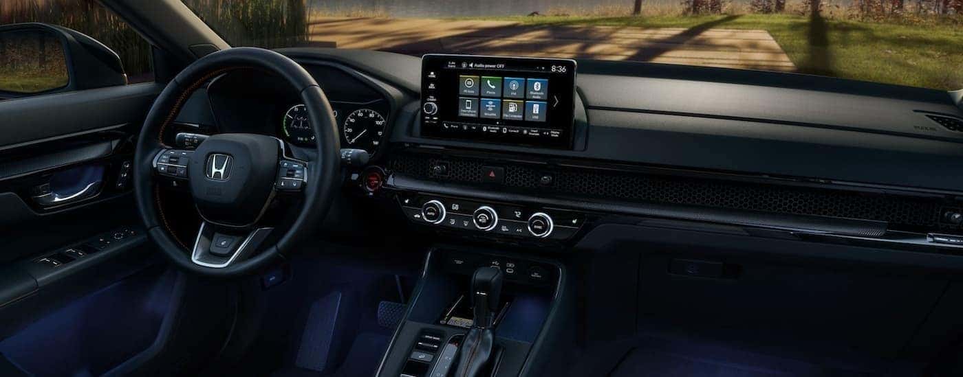The black interior and dash are shown in a 2025 Honda CR-V Hybrid for sale.