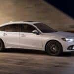 White 2022 Honda Civic driving through a tunnel