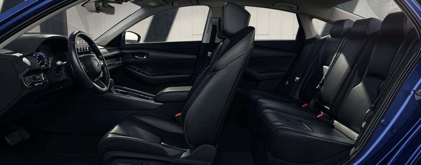 The black interior of a 2025 Honda Accord from the side.