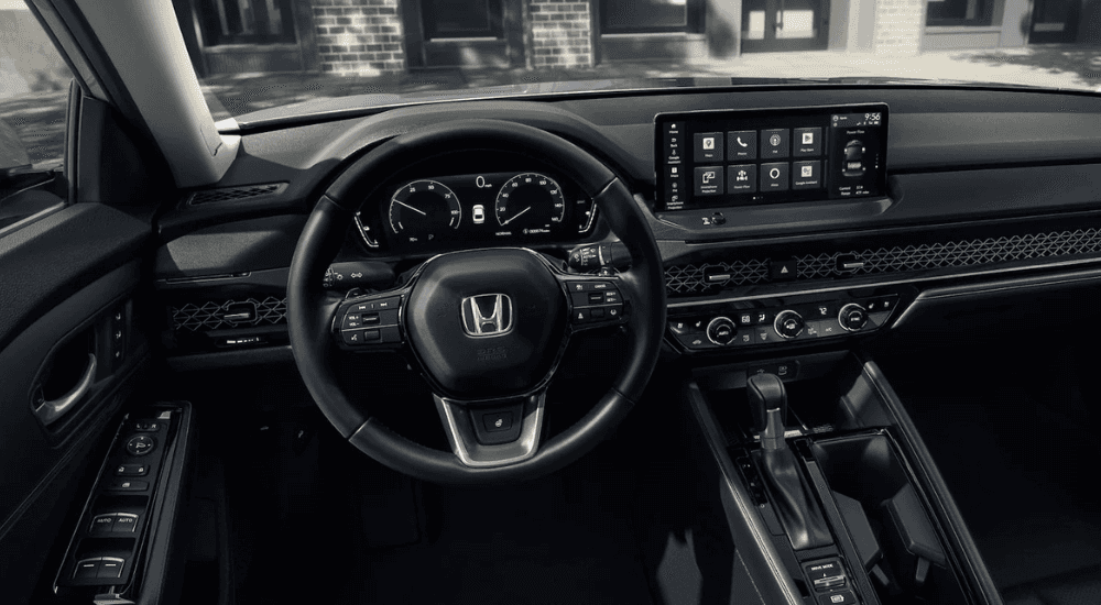 Interior of a 2025 Honda Accord for sake in Knoxville showing the digital gauge cluster and infotainment system