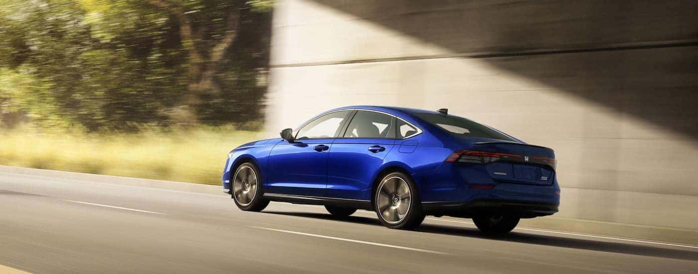 A blue 2025 Honda Accord from the side.