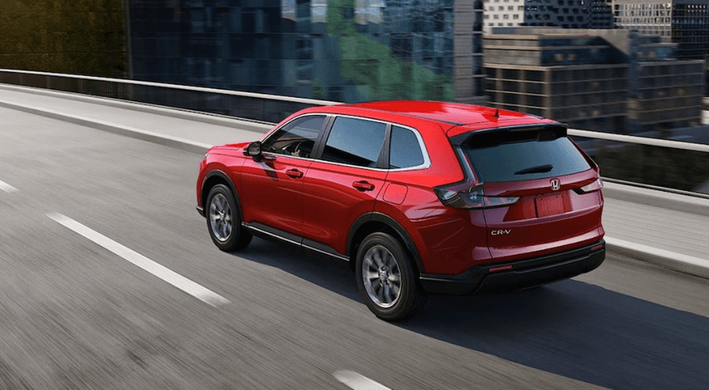 Red 2026 Honda CR-V Hybrid for sale near Alcoa on a test drive