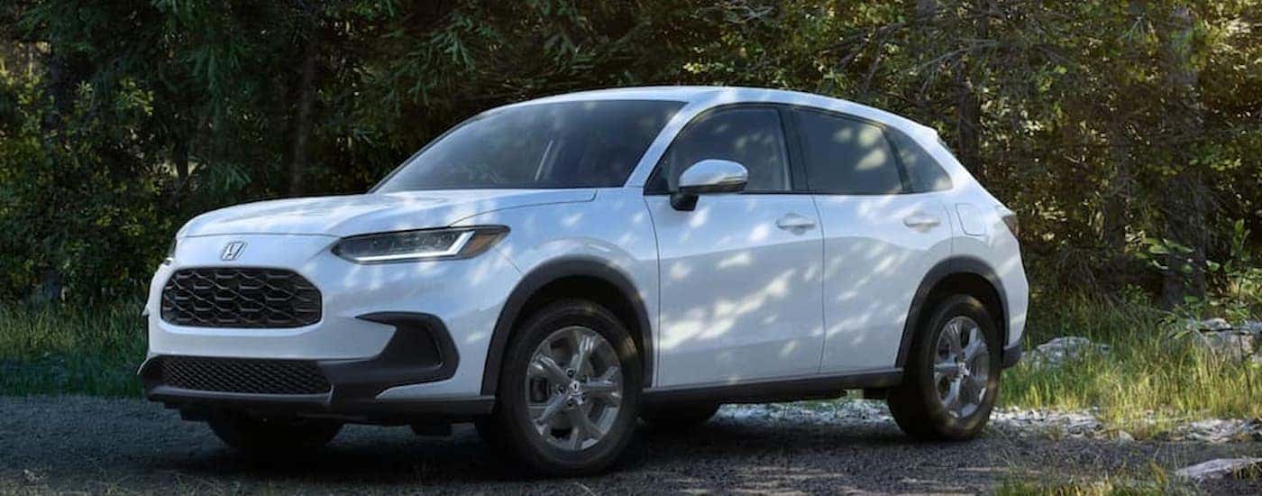 A white 2026 Honda HR-V parked off-road for sale