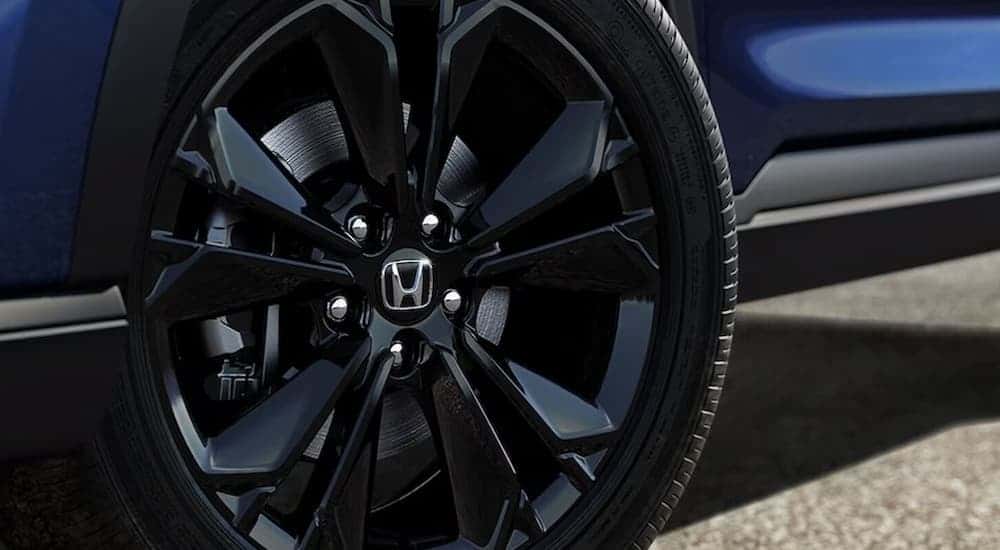 Black rim on a dark blue 2026 Honda CR-V