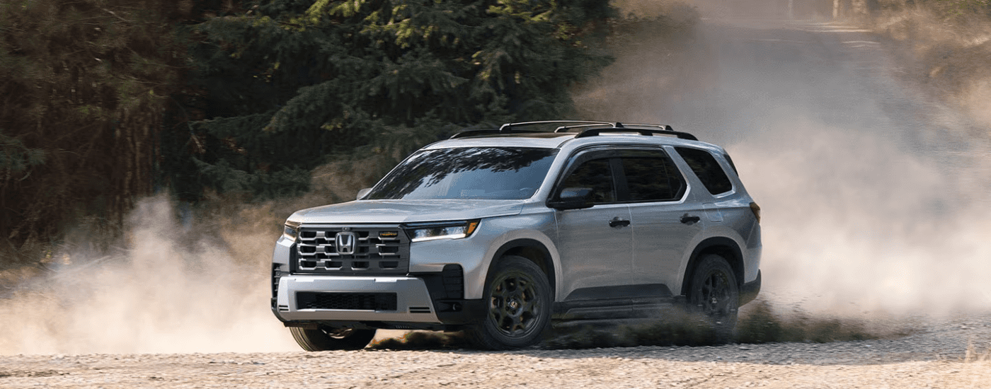Silver 2026 Honda Pilot kicking up dust