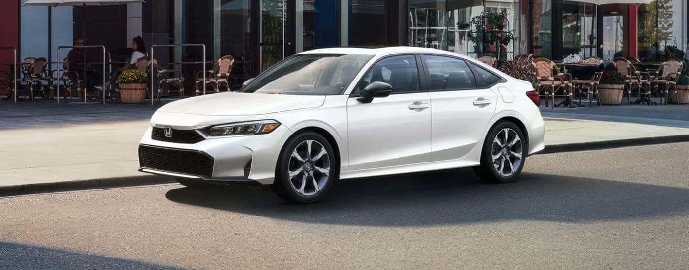 White 2026 Honda Civic on a city street.