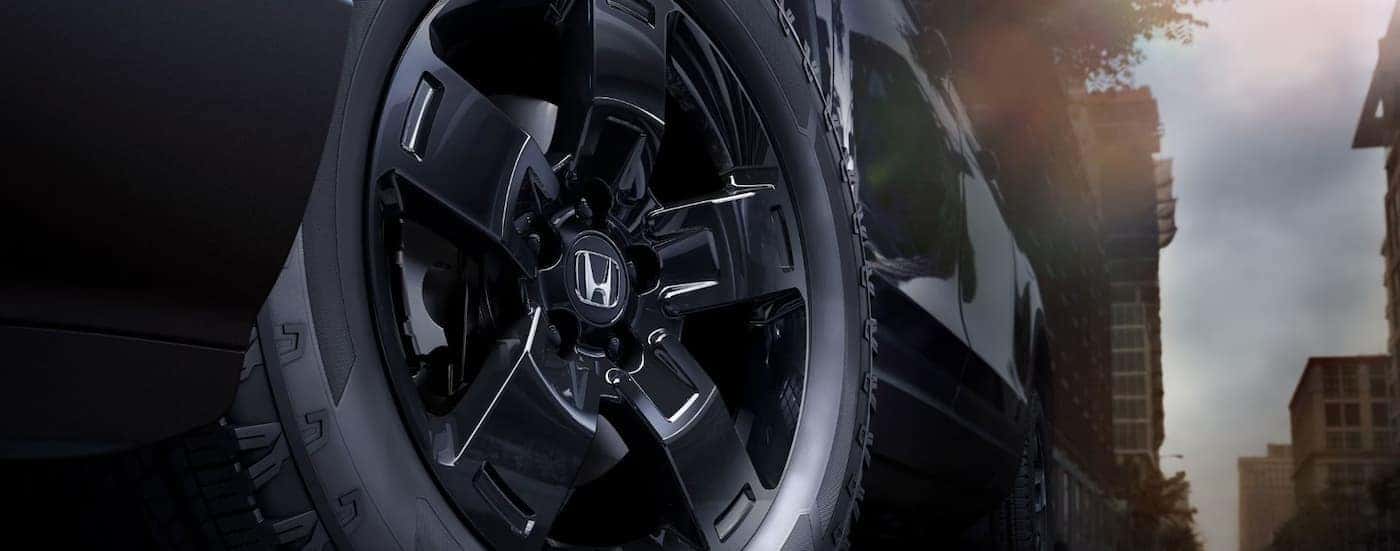 Black wheel on a black 2026 Honda Ridgeline TrailSport.