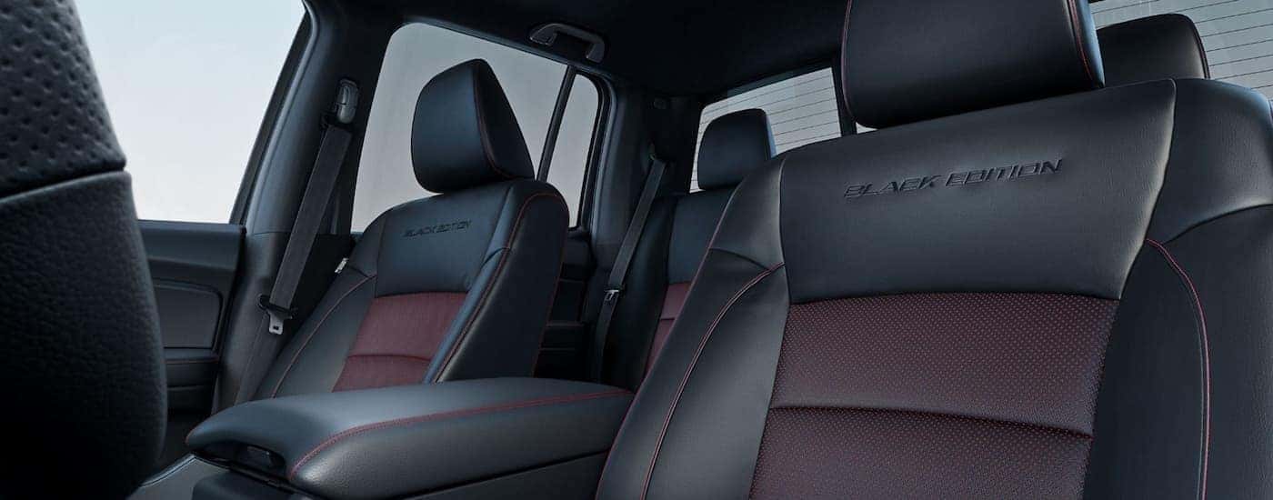 Black and maroon seating in a 2026 Honda Ridgeline Black Edition.