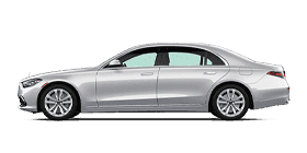 Side view of a white/silver Mercedes-Benz S-Class vehicle.